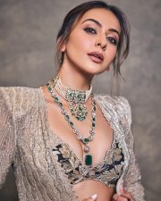 Gorgeous Indian Actress Rakul Preet in a Margot Floor Length Open Front Champagne Gold Long Jacket with a Plunging Neckline Bralette and Black Flared Skirt Pictures 08