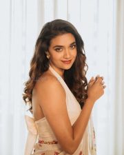 Gorgeous Keerthy Suresh in a White Floral Saree with Sleeveless Halter Neck Blouse Pictures 07