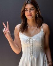 Gorgeous Kriti Sanon in a Sleeveless White Dress Pictures 01