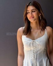 Gorgeous Kriti Sanon in a Sleeveless White Dress Pictures 03