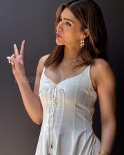 Gorgeous Kriti Sanon in a Sleeveless White Dress Pictures 04