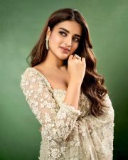 Gorgeous Nidhhi Agerwal in a White Floral Saree Pictures 01
