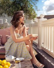 Gorgeous Raashi Khanna in a Floral Summer Thigh Slit Frock Photos 01