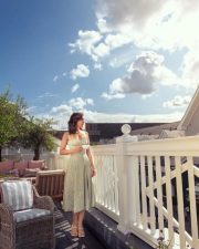 Gorgeous Raashi Khanna in a Floral Summer Thigh Slit Frock Photos 03