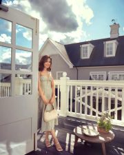 Gorgeous Raashi Khanna in a Floral Summer Thigh Slit Frock Photos 05