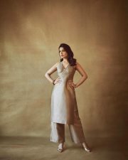 Gorgeous Raashi Khanna in a Golden and Blue Embroidered Sleeveless Dress Photos 02