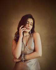 Gorgeous Raashi Khanna in a Golden and Blue Embroidered Sleeveless Dress Photos 03