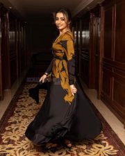 Gorgeous Trisha Krishnan in a Black and Yellow Maxi Dress Photos 01