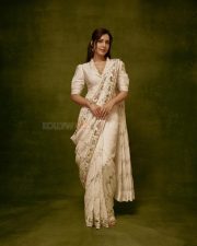 Graceful Raashi Khanna in an Ivory Linen Saree with Floral Embroidery with Puff Sleeve Blouse Photos 02
