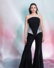 Heeramandi Actress Aditi Rao Hydari in a Black Corset Peplum Top with a Flared Trousers Photos 02