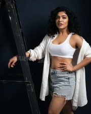 Heroine Rima Kalingal in a White Sports Bra and Denim Shorts Photoshoot Pictures 01