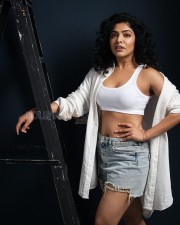 Heroine Rima Kalingal in a White Sports Bra and Denim Shorts Photoshoot Pictures 01