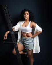 Heroine Rima Kalingal in a White Sports Bra and Denim Shorts Photoshoot Pictures 02