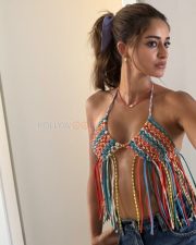 Hot Ananya Panday in a Multi Color Crochet Halter Bikini Top with Fringe Details and Denim Shorts Pictures 01