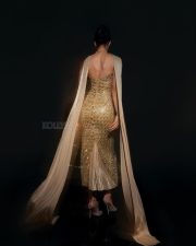 Hot Disha Patani in a Soft Gold Strapless Bodycon Gown Photos 02