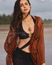 Hot Indian Actress Rakul Preet Singh in a Black Monokini with a Cutout Midriff with an Orange and Black Cover Up Pictures 01