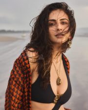 Hot Indian Actress Rakul Preet Singh in a Black Monokini with a Cutout Midriff with an Orange and Black Cover Up Pictures 02