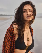Hot Indian Actress Rakul Preet Singh in a Black Monokini with a Cutout Midriff with an Orange and Black Cover Up Pictures 02