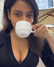 Hot Neha Sharma Drinking Coffee and Showing Erotic Cleavage Photos 01