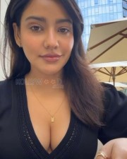 Hot Neha Sharma Drinking Coffee and Showing Erotic Cleavage Photos 02