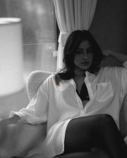 Hot Neha Sharma in a Black Lace Bra and Oversized White Shirt Photos 05
