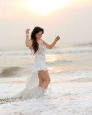 Hot Sakshi Agarwal in a White Sleeveless Lace Maxi Dress Pictures 06