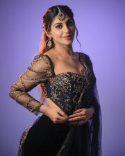 Hot Yashika Aannand in a Black Embroidered Netted Sleeve Top with a Black Skirt Photos 04