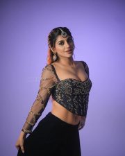 Hot Yashika Aannand in a Black Embroidered Netted Sleeve Top with a Black Skirt Photos 05