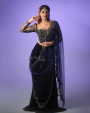 Hot Yashika Aannand in a Black Embroidered Netted Sleeve Top with a Black Skirt Photos 06