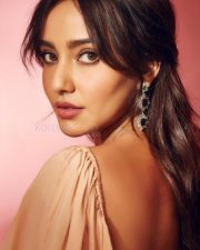 Hot and Bold Neha Sharma in an Off Shoulder Nude Bandeau Dress Photos 03
