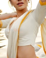 Hot and Bold Priya Prakash Varrier Seductive in a White Onam Saree Photos 01