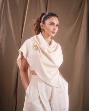 I Love You Rakul Preet Singh in a Structured Ivory Crop Top with a Matching One Shoulder Cape and Wide Leg Flared Trousers Pictures 03 I Love You Rakul Preet Singh in a Structured Ivory Crop Top with a Matching One Shoulder Cape and Wide Leg Flared Trousers Pictures 03