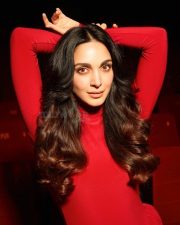 Iconic Actress Kiara Advani in a Red Turtleneck Bodycon Dress Photos 02