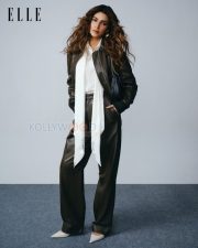 Iconic Actress Kriti Sanon in a Orange Ribbed Jacket Photos 08