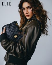 Iconic Actress Kriti Sanon in a Orange Ribbed Jacket Photos 10