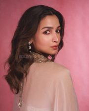 Indian Actress Alia Bhatt in a Custom Made Ivory and Gold Deep V Neck Blouse and Long Lehenga Skirt with a Sheer Cape Photos 01