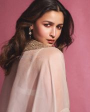Indian Actress Alia Bhatt in a Custom Made Ivory and Gold Deep V Neck Blouse and Long Lehenga Skirt with a Sheer Cape Photos 02