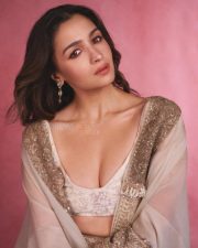 Indian Actress Alia Bhatt in a Custom Made Ivory and Gold Deep V Neck Blouse and Long Lehenga Skirt with a Sheer Cape Photos 03