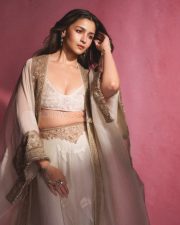 Indian Actress Alia Bhatt in a Custom Made Ivory and Gold Deep V Neck Blouse and Long Lehenga Skirt with a Sheer Cape Photos 05