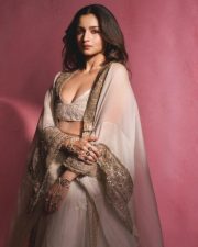 Indian Actress Alia Bhatt in a Custom Made Ivory and Gold Deep V Neck Blouse and Long Lehenga Skirt with a Sheer Cape Photos 06