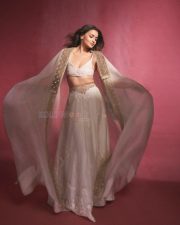 Indian Actress Alia Bhatt in a Custom Made Ivory and Gold Deep V Neck Blouse and Long Lehenga Skirt with a Sheer Cape Photos 09
