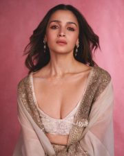 Indian Actress Alia Bhatt in a Custom Made Ivory and Gold Deep V Neck Blouse and Long Lehenga Skirt with a Sheer Cape Photos 10
