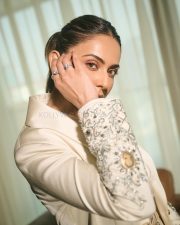 Indian Actress Rakul Preet Singh in an Ivory Blazer with Floral Lace Shirt and Mini Skirt Pictures 02