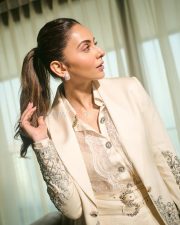Indian Actress Rakul Preet Singh in an Ivory Blazer with Floral Lace Shirt and Mini Skirt Pictures 07