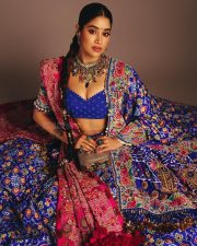 Indian Bollywood Actress Janhvi Kapoor in a Royal Blue and Hot Pink Designer Lehenga with a Blue Bustier Top Photos 04