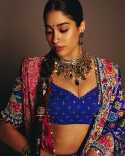 Indian Bollywood Actress Janhvi Kapoor in a Royal Blue and Hot Pink Designer Lehenga with a Blue Bustier Top Photos 05