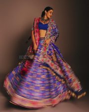 Indian Bollywood Actress Janhvi Kapoor in a Royal Blue and Hot Pink Designer Lehenga with a Blue Bustier Top Photos 07
