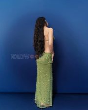 Irresistible Disha Patani Cleavage in a Olive Green Sequin Cutout Slit Gown Photos 05