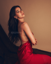 Irresistible Disha Patani Cleavage in a Red Deep V Spaghetti Strap Satin Gown Photos 04
