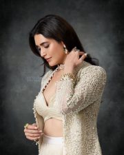 Irresistible Karishma Tanna in an Indo Western Outfit with Deep Bralette Blouse and Draped Skirt Photos 03